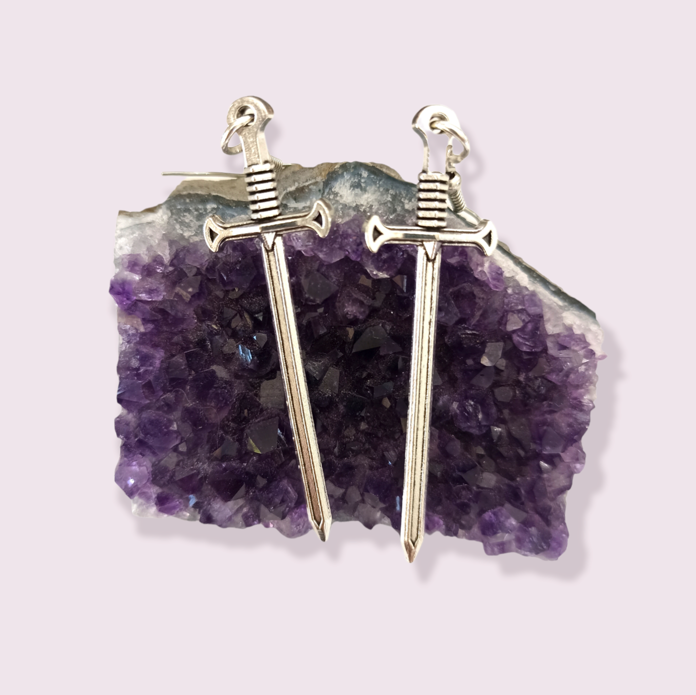 Make a statement with these stunning sword earrings, perfect for anyone trying to edge up their jewellery collection. Pendant size roughly 5.5cm for Medium and 8cm for Large. Material: zinc alloy. If you have a nickel allergy, please add a note to your order at checkout and I’ll switch the alloy hooks to nickel free hooks.