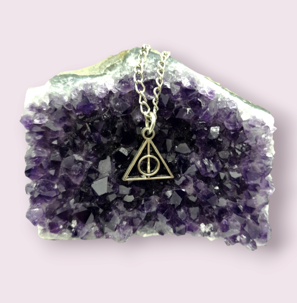 The must have staple necklace of any Harry Potter fan. This necklace is smaller than what is seen in the movies, making it a more wearable, everyday piece. Pendant Size roughly 1.2cm. Material: Zinc Alloy