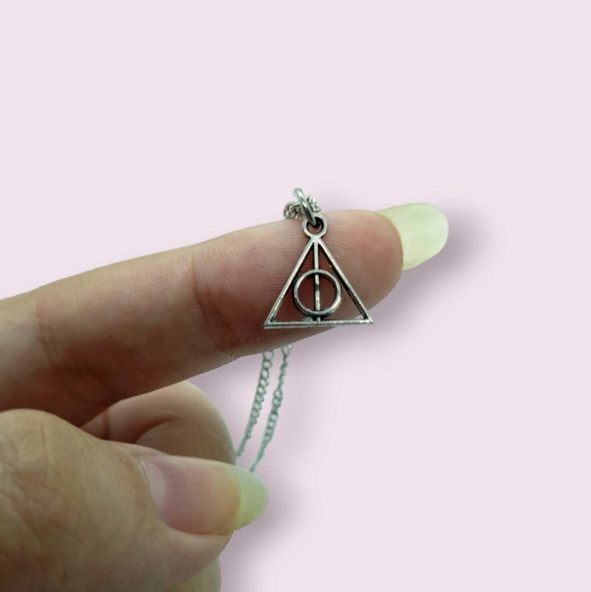 The must have staple necklace of any Harry Potter fan. This necklace is smaller than what is seen in the movies, making it a more wearable, everyday piece. Pendant Size roughly 1.2cm. Material: Zinc Alloy