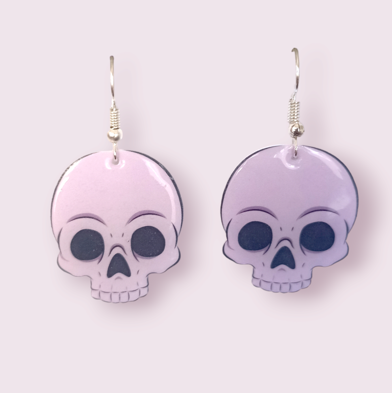 How cute are these little skulls? These stunning earrings are designed and made in-house and are also available in grey. Material: shrink film, resin, nickel free hooks. Please note as these are all handmade, minor differences may occur from piece to piece. All shrink film products can take about a week to send out as they are currently made to order