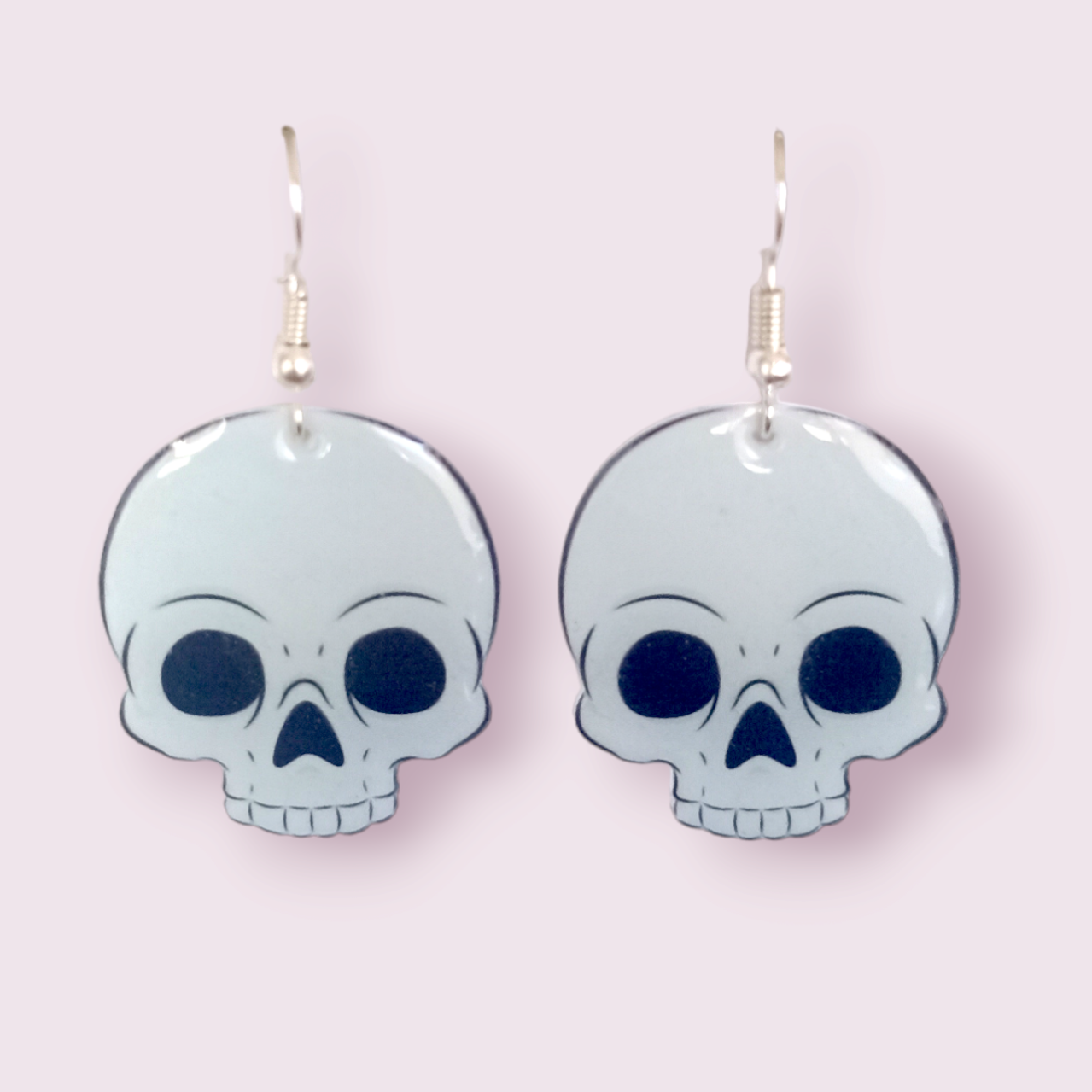 How cute are these little skulls? These stunning earrings are designed and made in-house and are also available in grey. Material: shrink film, resin, nickel free hooks. Please note as these are all handmade, minor differences may occur from piece to piece. All shrink film products can take about a week to send out as they are currently made to order