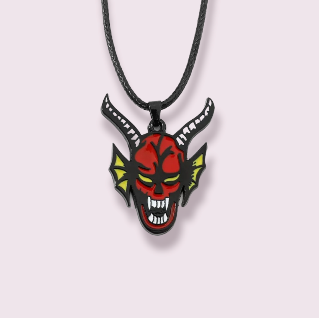 Calling all Stranger Things fans! If you've watched the most recent season, you'll know why I'm so excited about this item. Inspired by the DnD club featured in season 4, this is a must have collectable for any ST fan. Pendant Size Roughly 3x3.5cm. Material: Zinc Alloy and enamel.