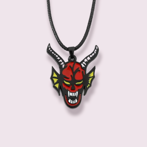 Calling all Stranger Things fans! If you've watched the most recent season, you'll know why I'm so excited about this item. Inspired by the DnD club featured in season 4, this is a must have collectable for any ST fan. Pendant Size Roughly 3x3.5cm. Material: Zinc Alloy and enamel.