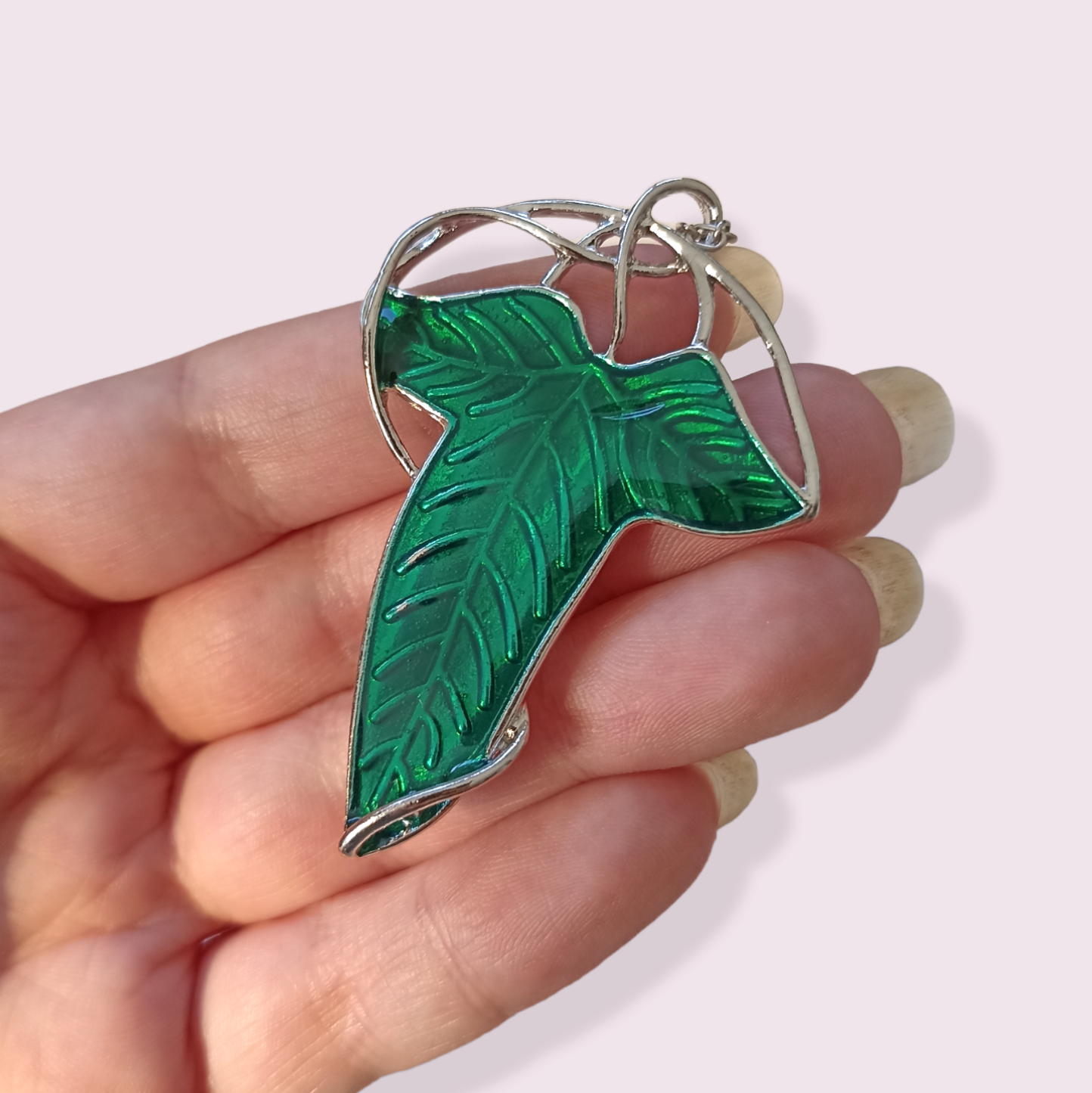 Please note some of the leaf veining is visible through the enamel on the left