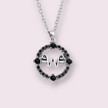 Load image into Gallery viewer, If you&#39;re as much of a fan of the new Addams Family series, Wednesday, this necklace is sure to make your squeal. Inspired by the family heirloom Morticia gives to Wednesday to help with her psychic gifts. Size roughly 2.5cm, material zinc alloy 
