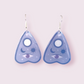 These stunning earrings are designed and made in-house. Material: shrink film, resin, nickel free hooks. Please note as these are all handmade, minor differences may occur from piece to piece.  All shrink film products can take about a week to send out as they are currently made to order