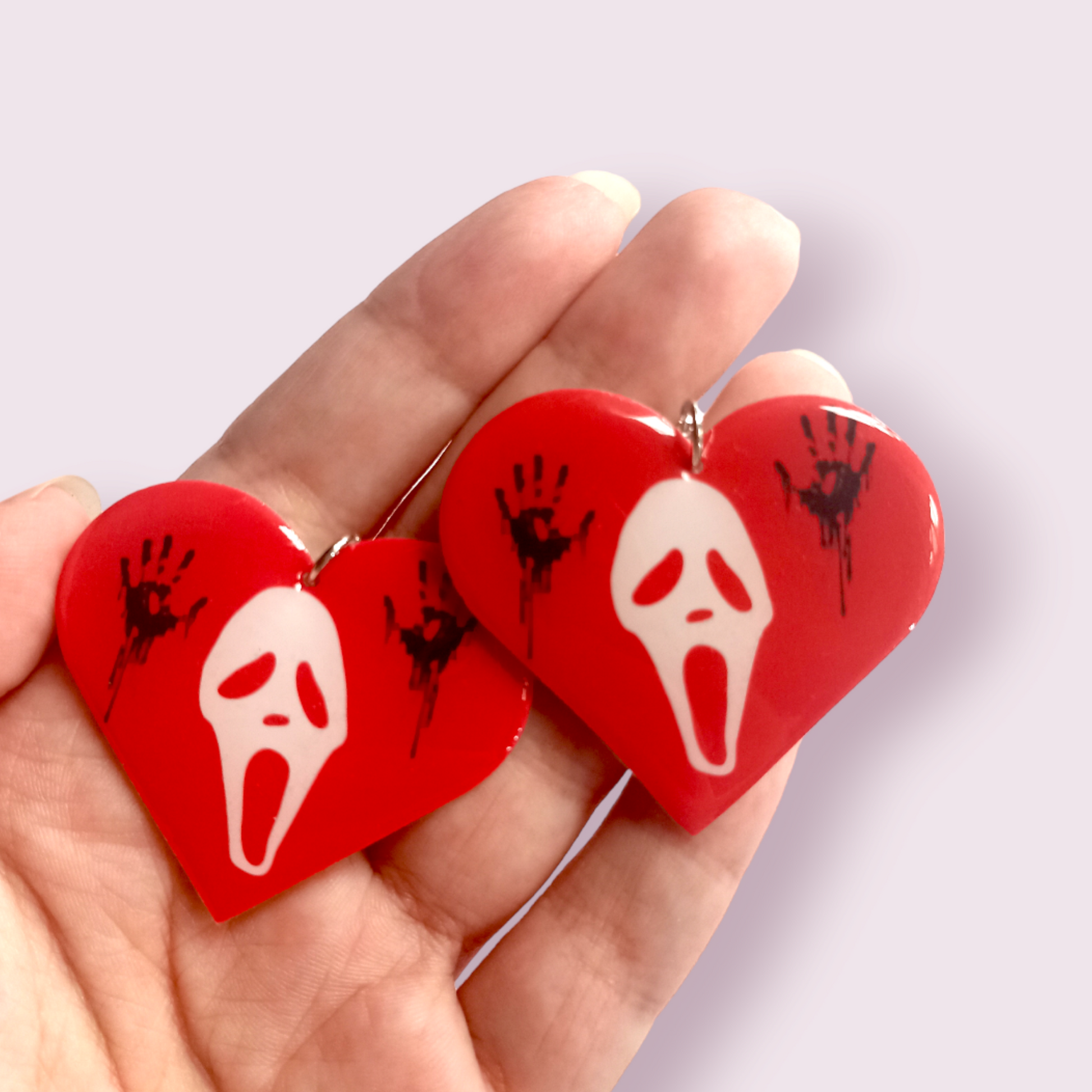 Inspired by my favourite slasher killer, Ghostface. These stunning earrings are designed and made in-house. Material: shrink film, resin, nickel free hooks. Size 4x4.5cm. Please note as these are all handmade, minor differences may occur from piece to piece.