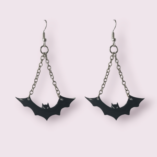 These spooky little guys are sure to delight any alt babe. These stunning earrings are designed and made in-house. Hanging length roughly 5cm, width 4.5cm. Material: shrink film, resin, nickel free hooks. Please note as these are all handmade, minor differences may occur from piece to piece. Matching necklace coming soon