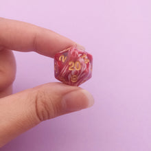Load image into Gallery viewer, This beautiful yet somewhat gorgy dice set resembles spilled blood mixing with liquids.

We&#39;re trying out something new and these stunning limited addition resin DnD dice are just a little teaser before we hopefully launching our own custom dice range later this year. All of our dice will be limited and mostly will not be restocked as each batch comes out differently. Please note each set will be different to the next depending on the pour.
