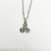 Load image into Gallery viewer, A unique gift for those who are drawn to spirituality and ancient Celtic symbolism. Also known as a Triskelion. Pendant Size Roughly 1.4cm. Material: zinc alloy. Locally sourced and handmade by The Raven’s Claw. 
