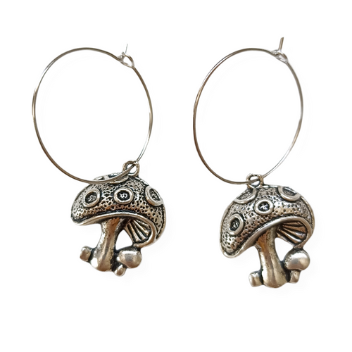 These adorable mushroom earrings would make an amazing gift for those drawn to nature, spirituality or the cottage core aesthetic. Pendant Size Roughly 2cm, hoop size roughly 2.4cm. Material: zinc alloy. Locally sourced and handmade by The Raven’s Claw. 