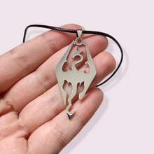 Load image into Gallery viewer, One of my best selling necklaces and a must have item for those obsessed with the fantasy game Skyrim. Size roughly 4.5x2.5cm. Material: zinc alloy 

