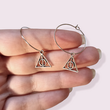 Load image into Gallery viewer, The must have staple peice of any Harry Potter fan. Pendant Size roughly 1.2cm, hoop 2.4cm. Material: Zinc Alloy. Add a note to your order if you would like the hoops to be switched to nickel free hooks
