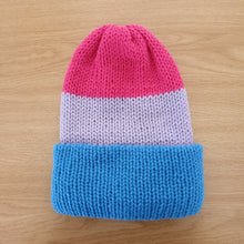 Load image into Gallery viewer, These gorgeous LGBTQ+ beanies were created as an exclusive item for The Raven’s Claw by the talented artist Whimsy Wool. Each beanie is entirely made by hand. Size: Adult Large – Wash on delicate. 
