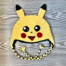 Load image into Gallery viewer, This incredible crochet beanie was created as an exclusive item for The Raven’s Claw by the talented artist Whimsy Wool. Each beanie is entirely made by hand and takes about six hours to make a single hat. This beanie would make any Pokémon fan super happy! Size: Adult Large – Wash on delicate 
