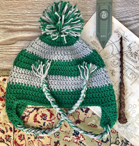 This incredible crochet beanie was created as an exclusive item for The Raven’s Claw by the talented artist Whimsy Wool. Each beanie is entirely made by hand. Perfect for any Harry Potter fan in house Slytherin. Size: Adult Large – Wash on delicate 