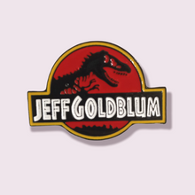 Load image into Gallery viewer, My new favourite pin! A unique gift for any fans of Jurassic park and World. Pendant Size 3x4.3cm. Material: Zinc Alloy 

