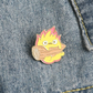 A heart-warming gift for those who are fans of the beloved Studio Ghibli anime “Howl’s Moving Castle”, inspired by the fire demon Calcifer who fuels Howl’s castle. Pin Size Roughly 3cm. Material: Enamel and zinc alloy 