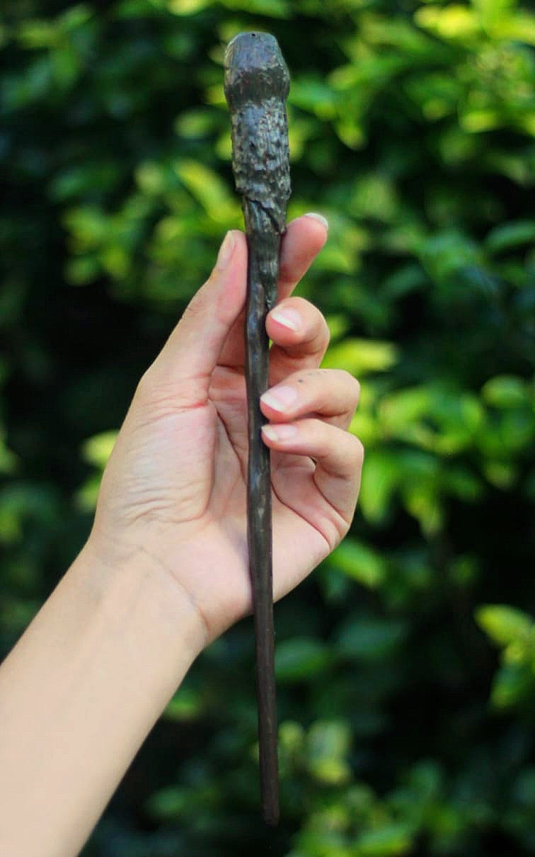 A must have for any Harry Potter fan. These incredible wands were hand created as an exclusive item for The Raven’s Claw by the talented artist Jaded Dragon Creations. Each wand is sculpted, hand cast and individually painted and takes multiple days to make a single wand. Wands measure at roughly 27cm and are made from a flexible material to aid in durability. As they are all made by hand, some slight differences may appear between wands. Wand care: do not bend and avoid contact with moisture.